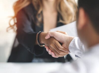 Businesswoman handshake and business people. Successful business concept.