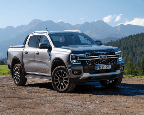 A Ford pickup truck parked outdoors with a mountainous backdrop, representing the types of Ford Super Duty vehicles that have been involved in roof-crush and rollover safety litigation, particularly among certain model years.